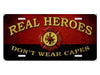 Fire Dept. "Real Heroes Don't Wear Capes"  Metal License Plate